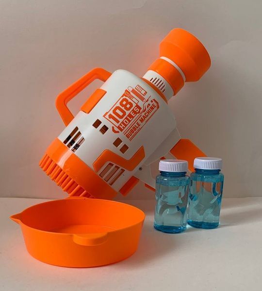 Пістолет мильних бульбашок Bubble launching machine 108 отворів жовтогарячий KB1143 фото